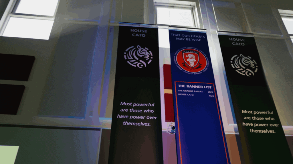 Orange County Classical Academy banner with inspirational quote and school logo.